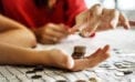 Counting change Cash-strapped Canadians using homes as ATMs to pay off bills